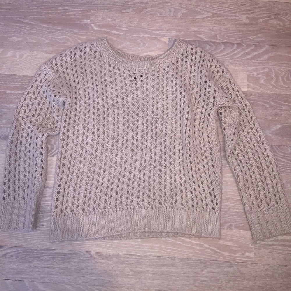 Beige holy sweater